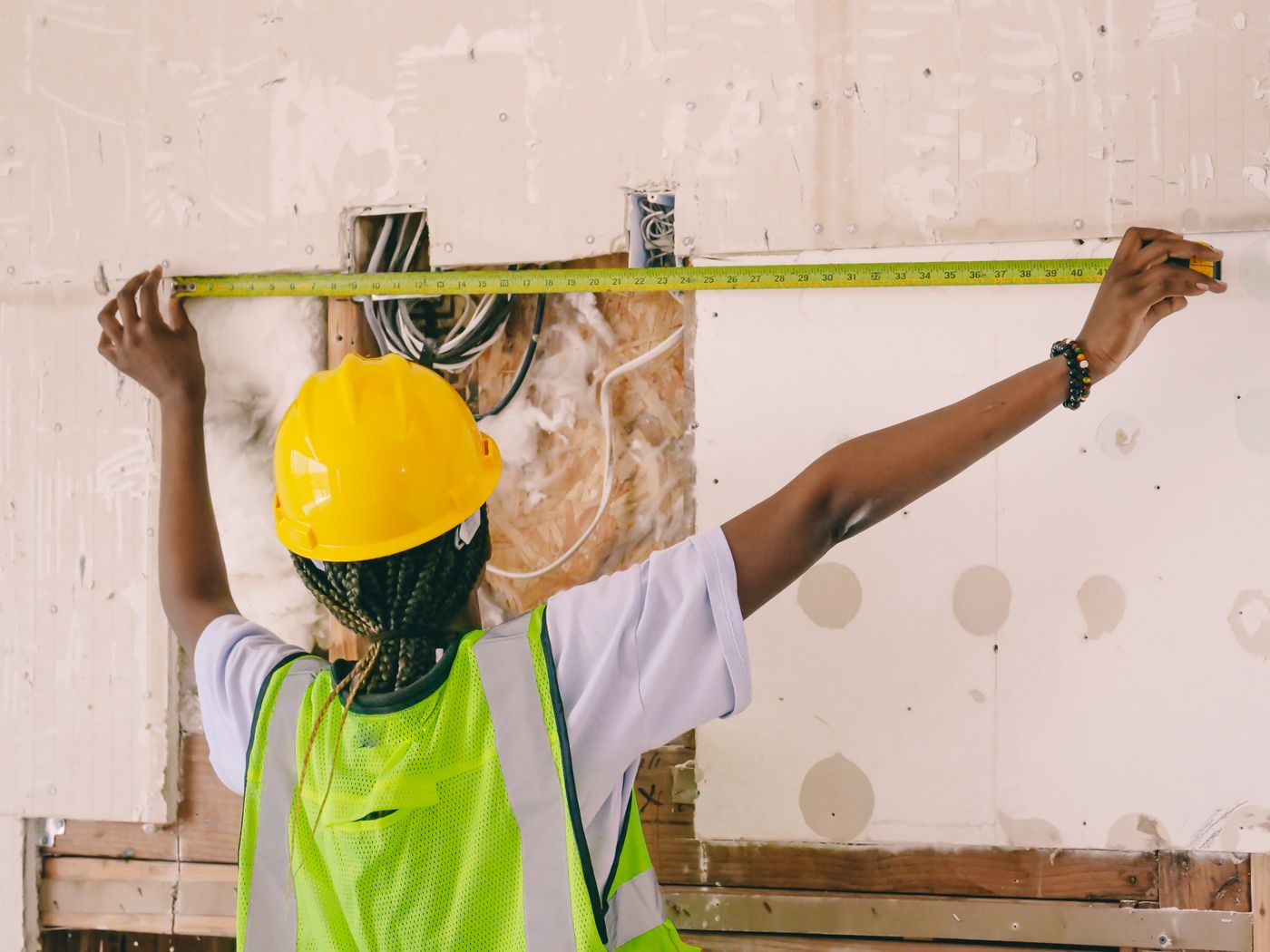 Construction professional working safely on a building project